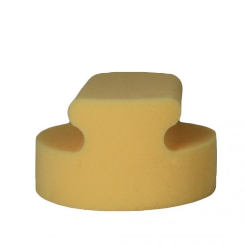 Yellow foam block on a white background
