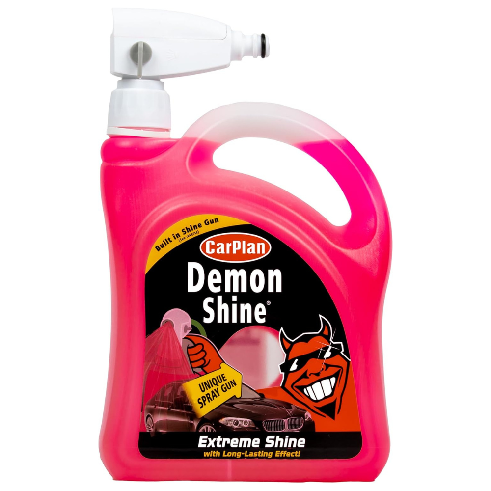 Pink bottle of CarPlan Demon Shine with a white pump on a white background