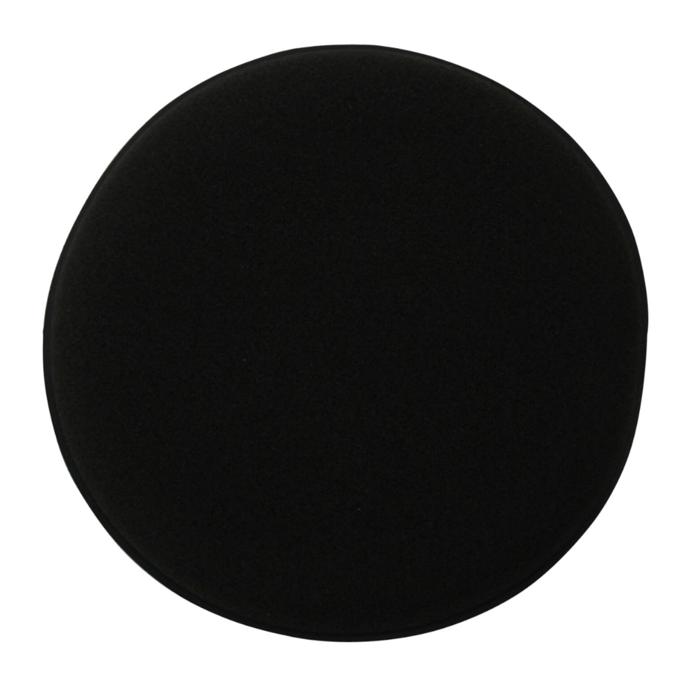 Black 5 inch round sponge applicator pad with smooth foam surface.